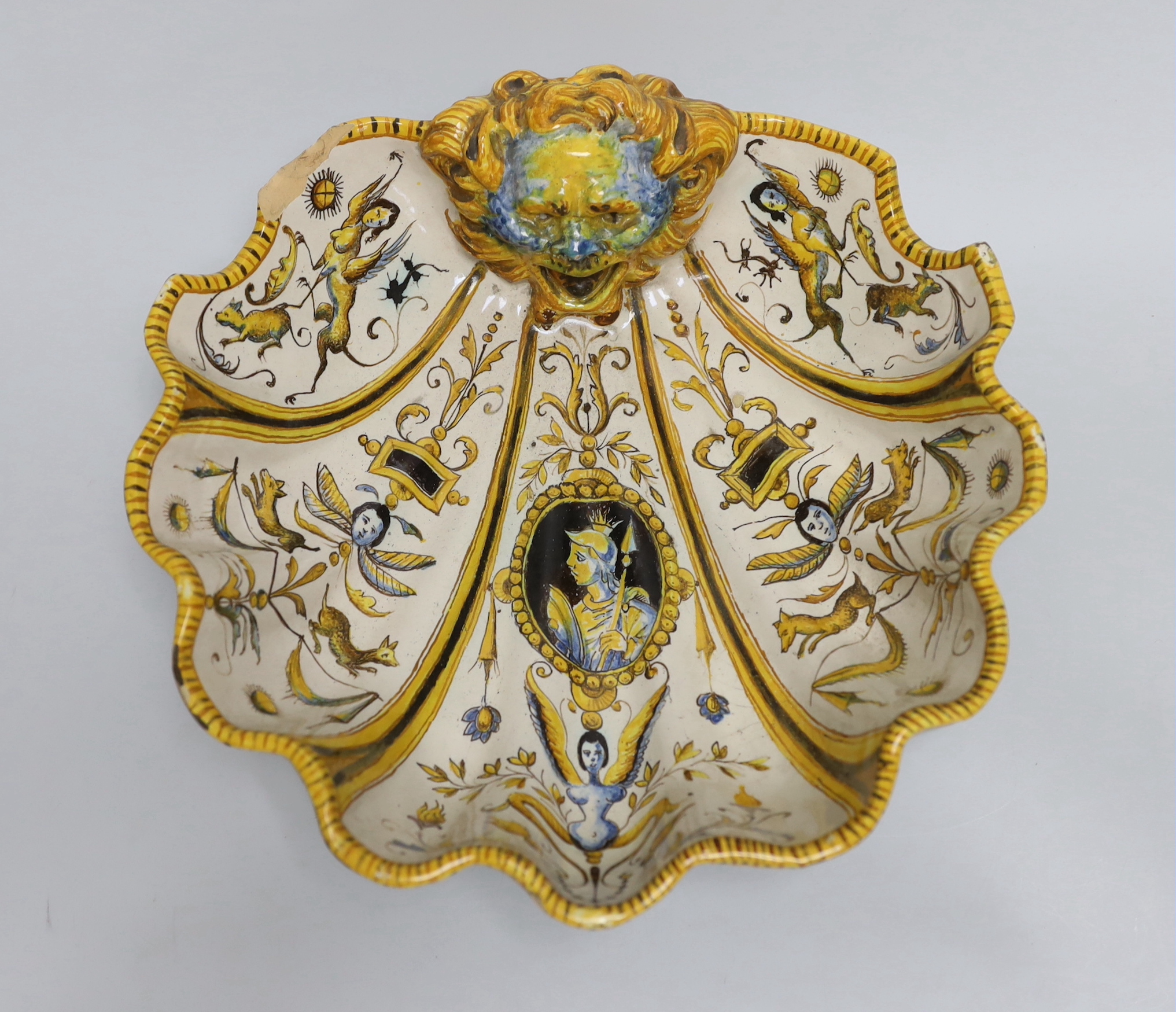 A late 19th/early 20th century Cantagalli maiolica scallop shell shaped dish, painted cockerel mark to base. 29cm long